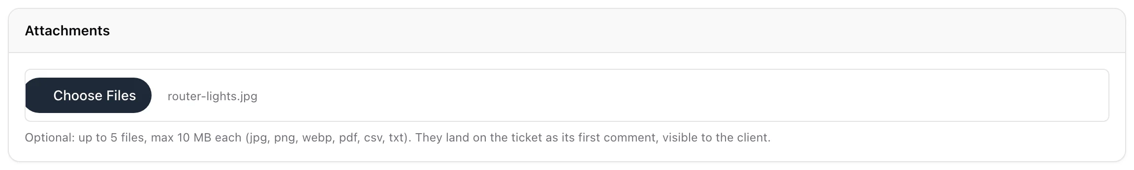 The Attachments card on the Add ticket form with one file chosen and the limits printed underneath