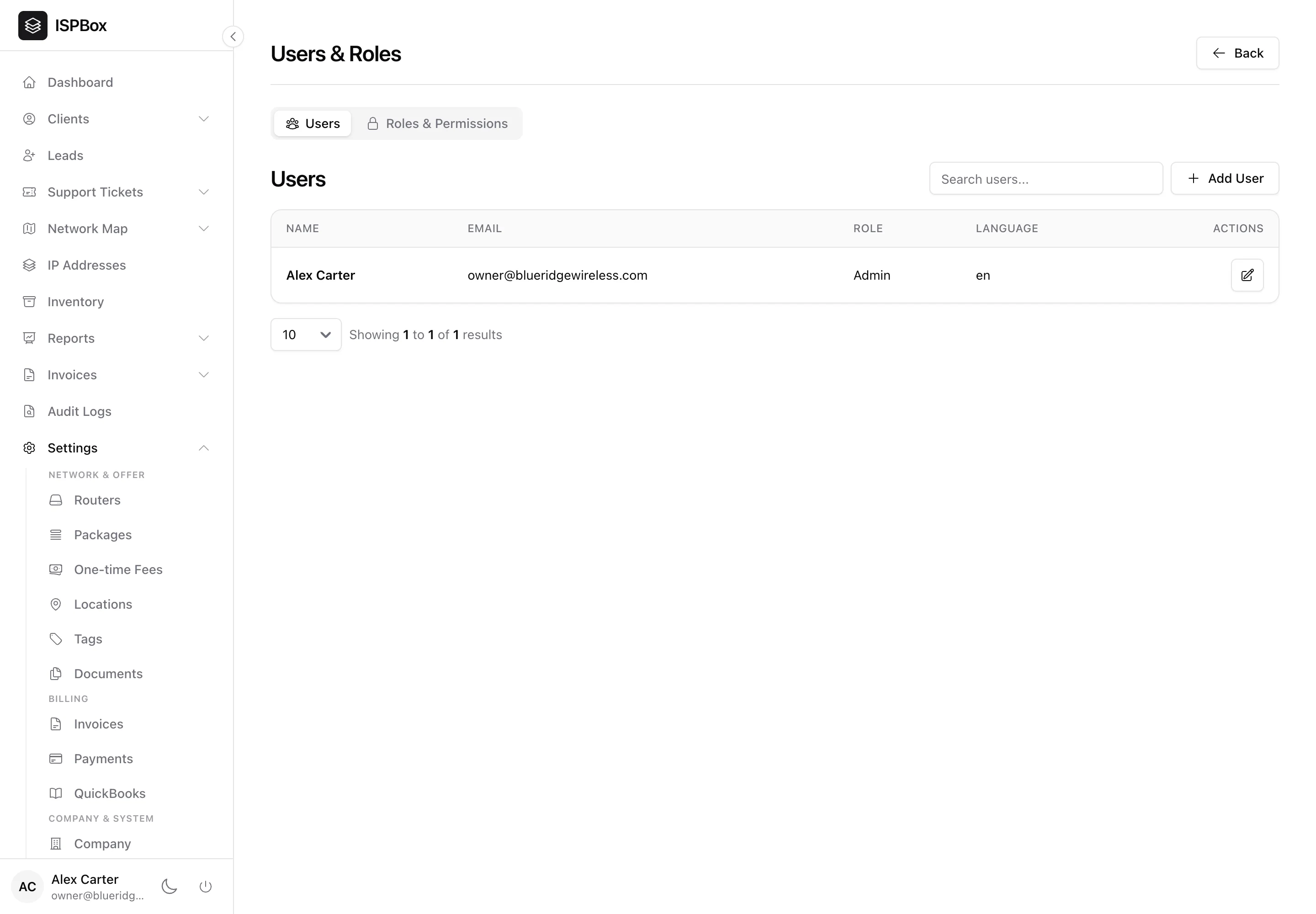 The Users tab listing a staff member with name, email, role and language, and an Add User button